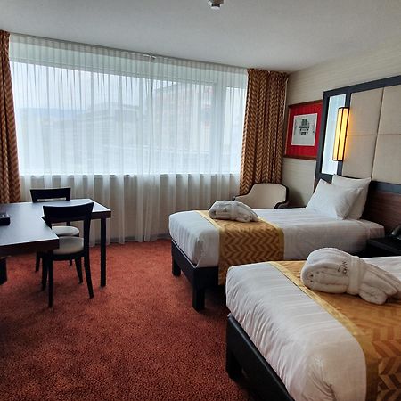 แนช สวีท โฮเต็ล Hotel Le Grand Saconnex ภายนอก รูปภาพ