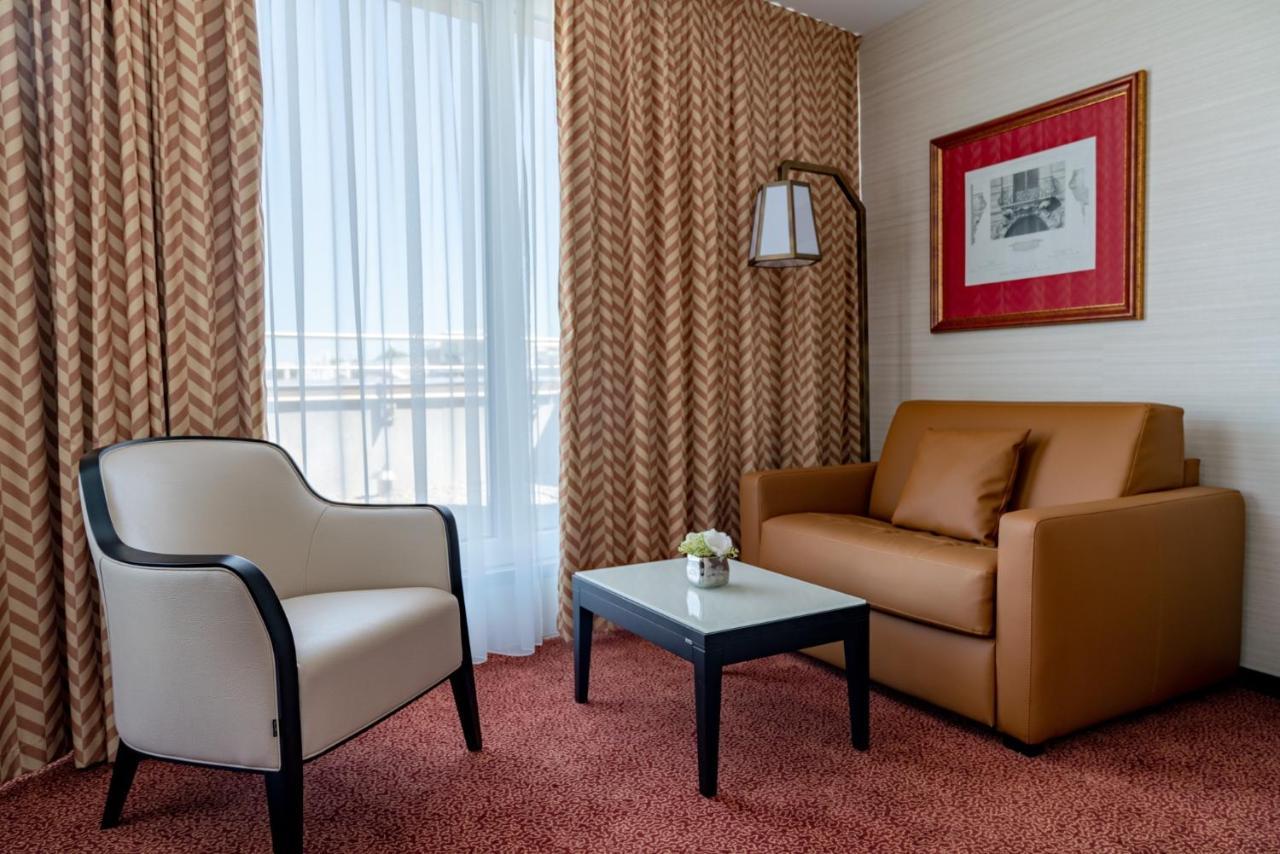 แนช สวีท โฮเต็ล Hotel Le Grand Saconnex ภายนอก รูปภาพ