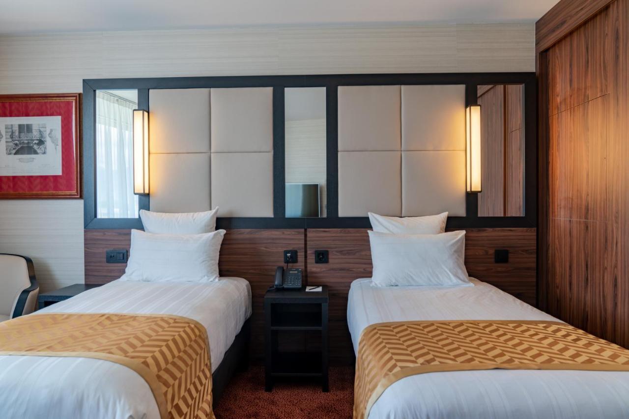 แนช สวีท โฮเต็ล Hotel Le Grand Saconnex ภายนอก รูปภาพ